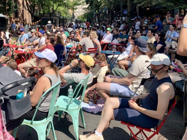 A large crowd gathered on Montague Street in Brooklyn Heights on Sunday for a special Open Streets World Cup screening. Photo: Mary Frost/Brooklyn Eagle