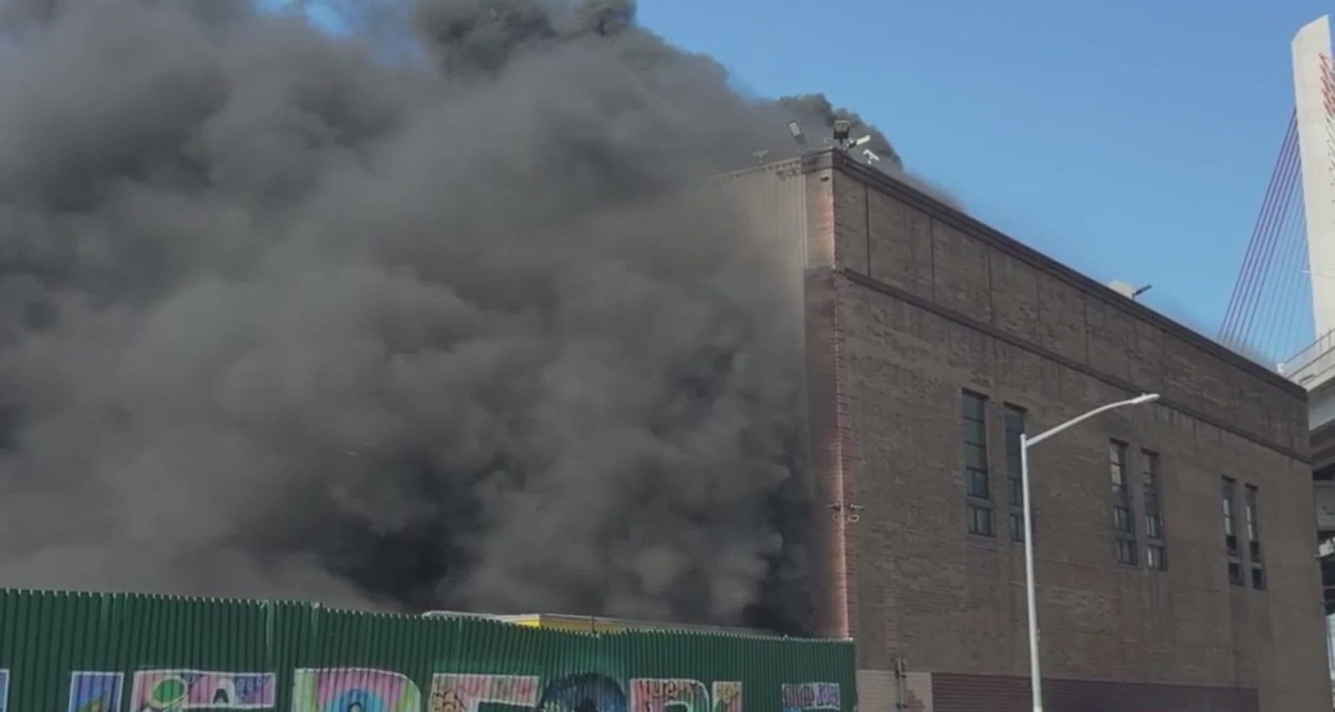 News 12 | Brooklyn | Thick Black Smoke Billows From Greenpoint Warehouse As Crews Battle Blaze