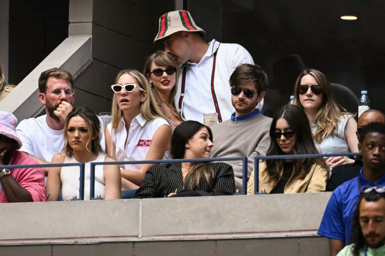 (FILES) (Top Row L-R) US musician Taylor Swift and US NFL football player Travis Kelce attend the men's final match between Italy's Jannik Sinner and USA's Taylor Fritz on day fourteen of the US Open tennis tournament at the USTA Billie Jean King National Tennis Center in New York City, on September 8, 2024.
