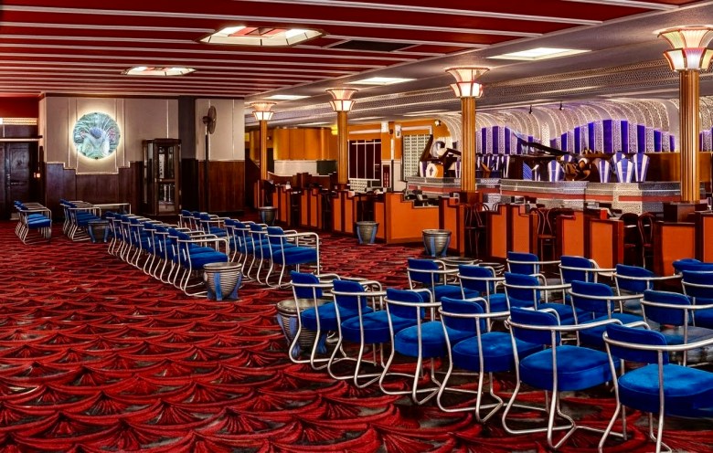 Cherry red, cobalt blue and silver, Alpha “Sogata’s” 1935 redecoration of the Savoy Ballroom caused a sensation in New York’s artistic circles.