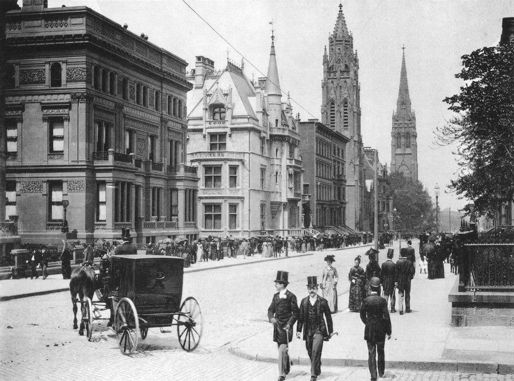 View of the West side of Fifth Avenue, North from 51st street, showing residences of Elliott F. Shepard, brother in law of William K. Vanderbilt, whose home is next to it. Further North is St. Thomas Episcopal Church and 5th Avenue Presbyterian Church, New York City.