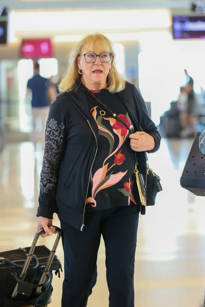 Donna Kelce (seen here walking through a New York City airport) has landed in New York City for her son Travis Kelce’s wedding to Taylor Swift. BACKGRID
