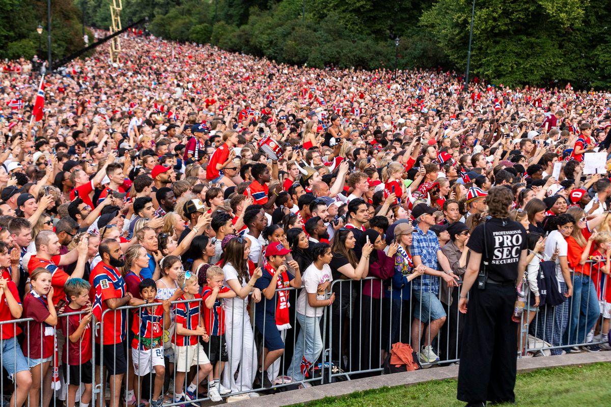 Supporters wave for Norway's national football team at Slottsplassen in Oslo after their return to Norway