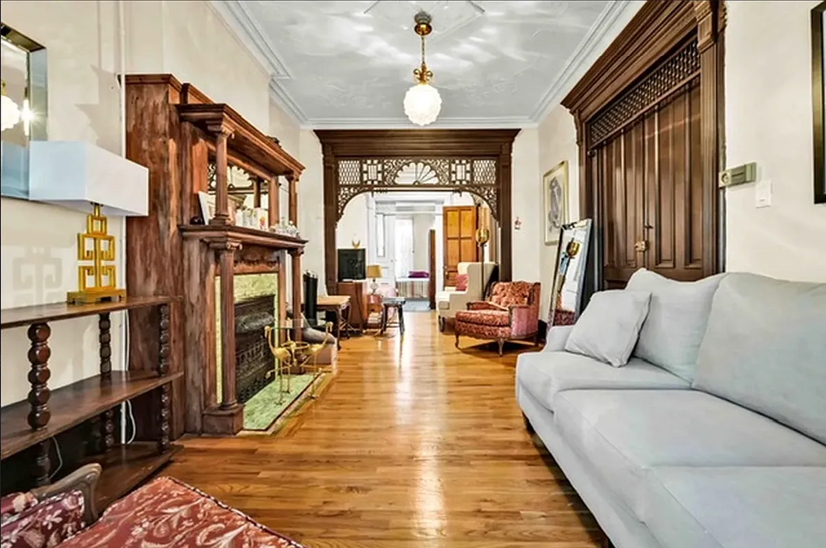parlor with fretwork, wood floor