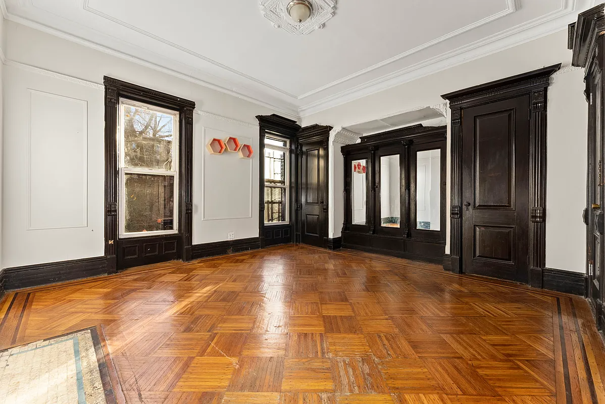 room with wood floor, built-in