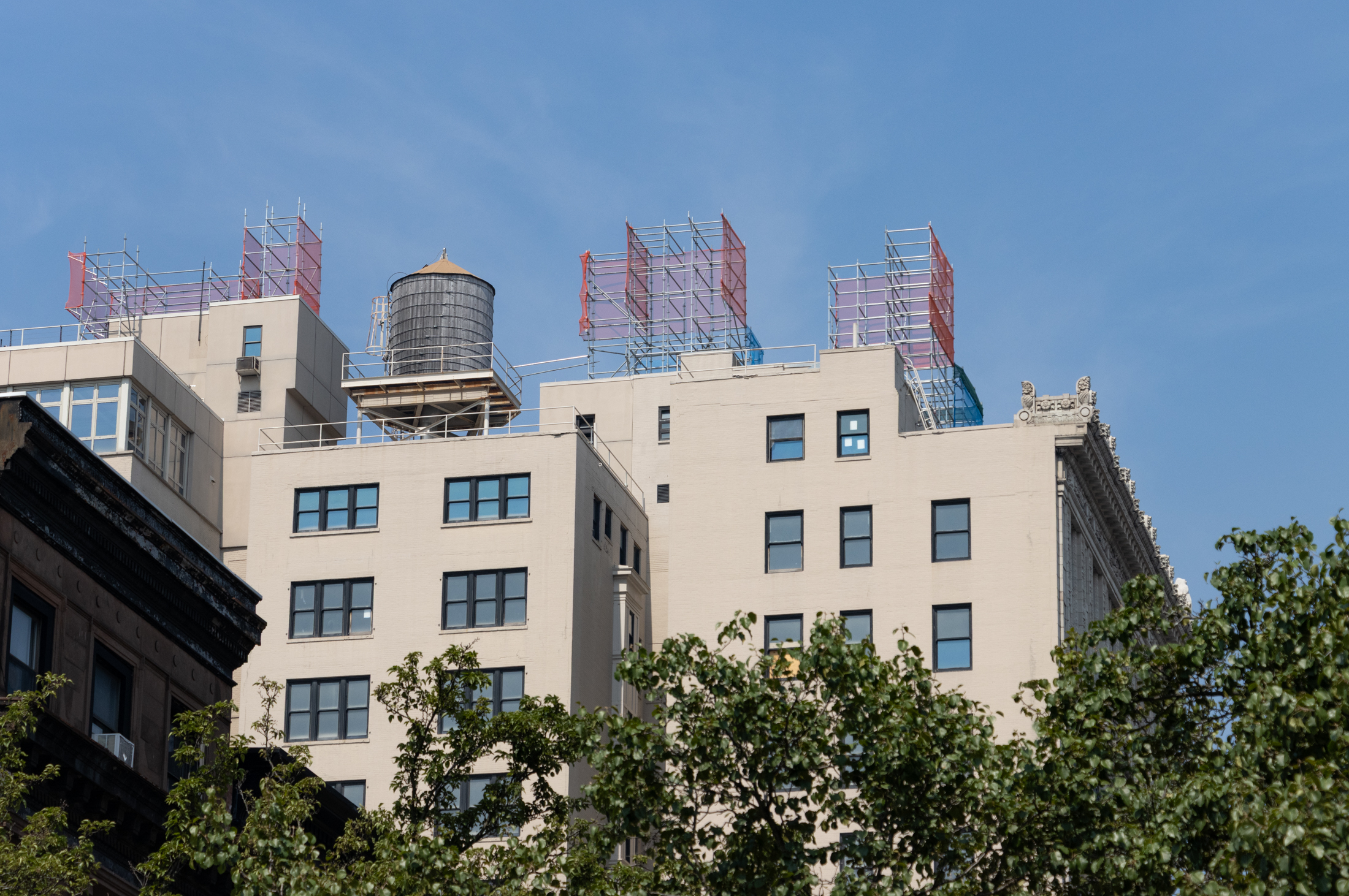 mockups and a water tower on the rooftop