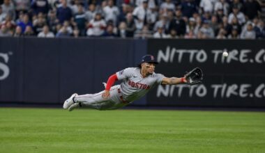 Ceddanne Rafaela making a diving catch for the Boston Red Sox