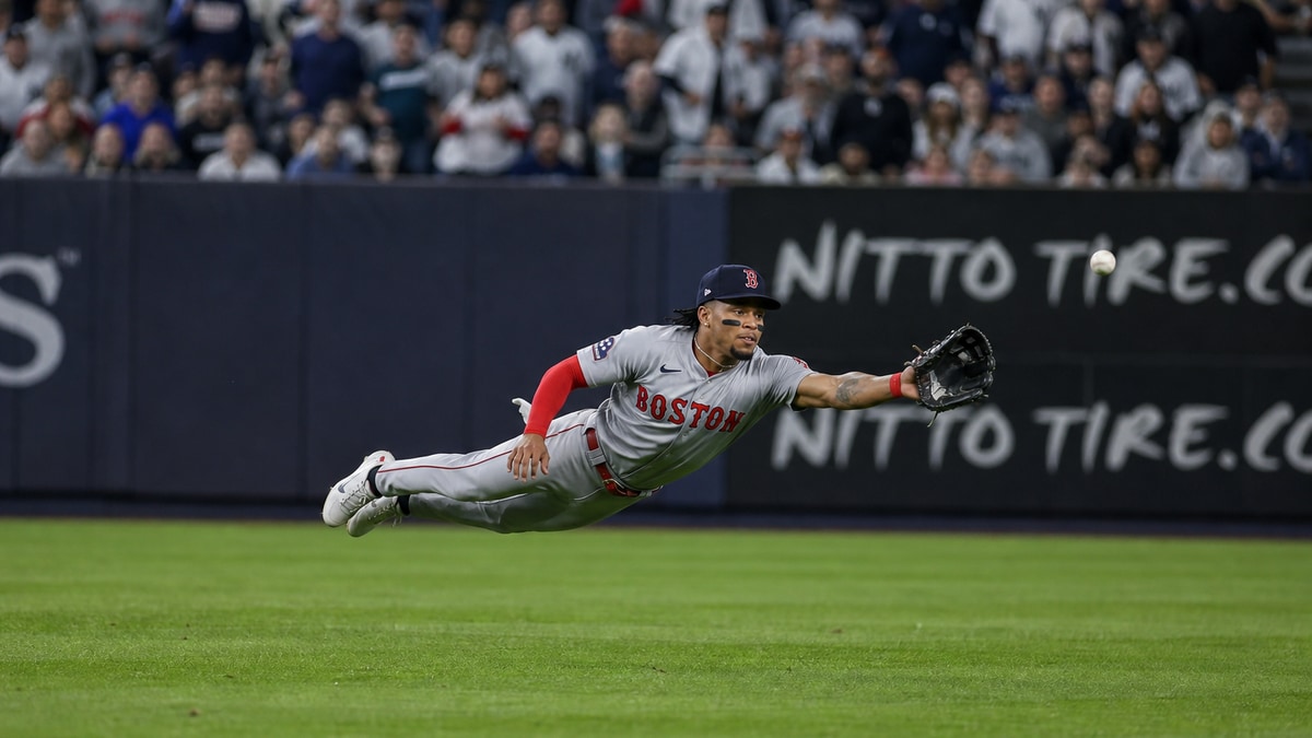 Ceddanne Rafaela making a diving catch for the Boston Red Sox