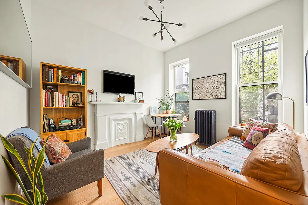clinton hill - living room with white walls, mantel