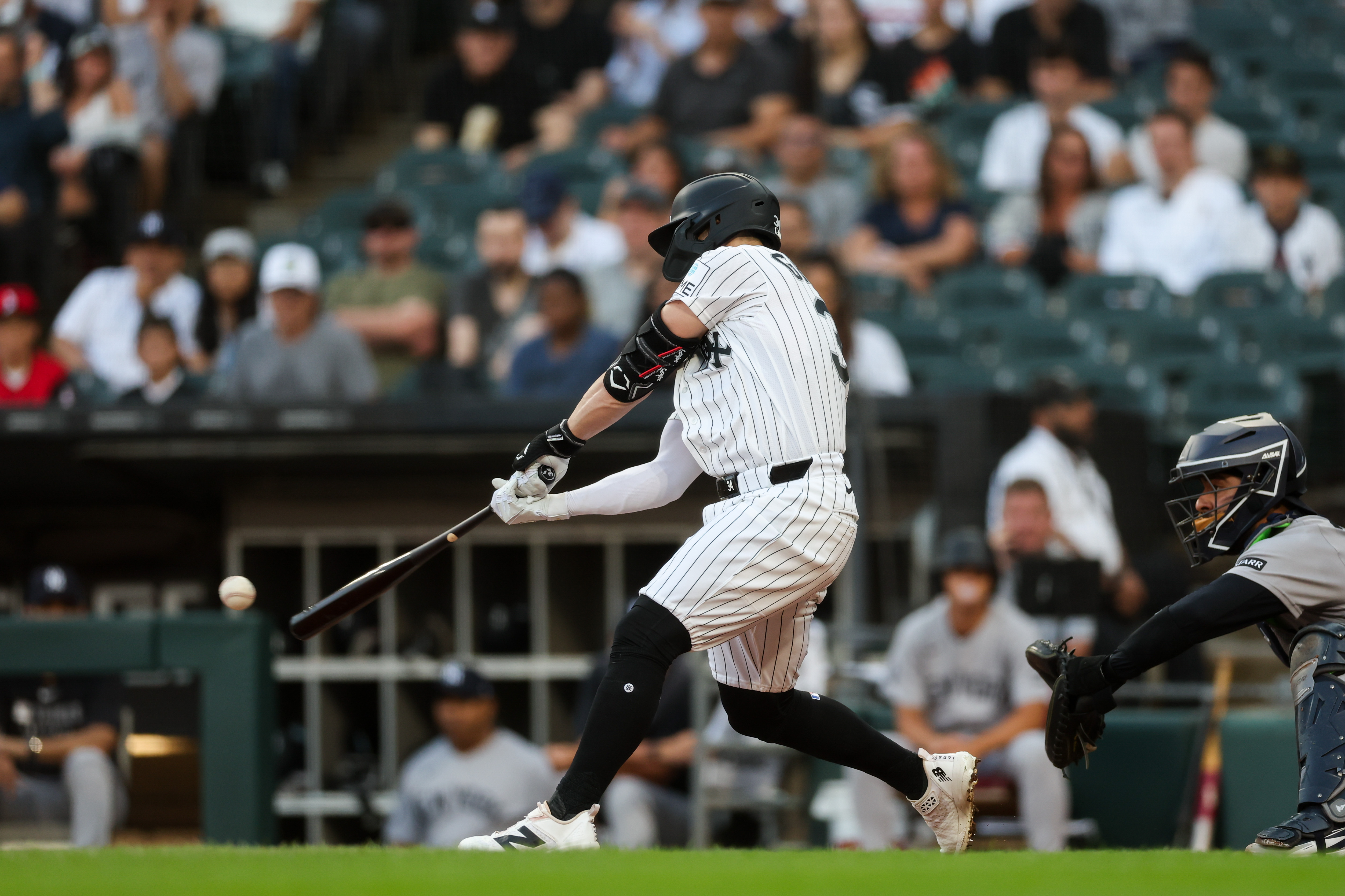 White Sox designated hitter Randal Grichuk (34) hits a double during the first inning against the Yankees at Rate Field July 27, 2026 in Chicago. (Armando L. Sanchez/Chicago Tribune)