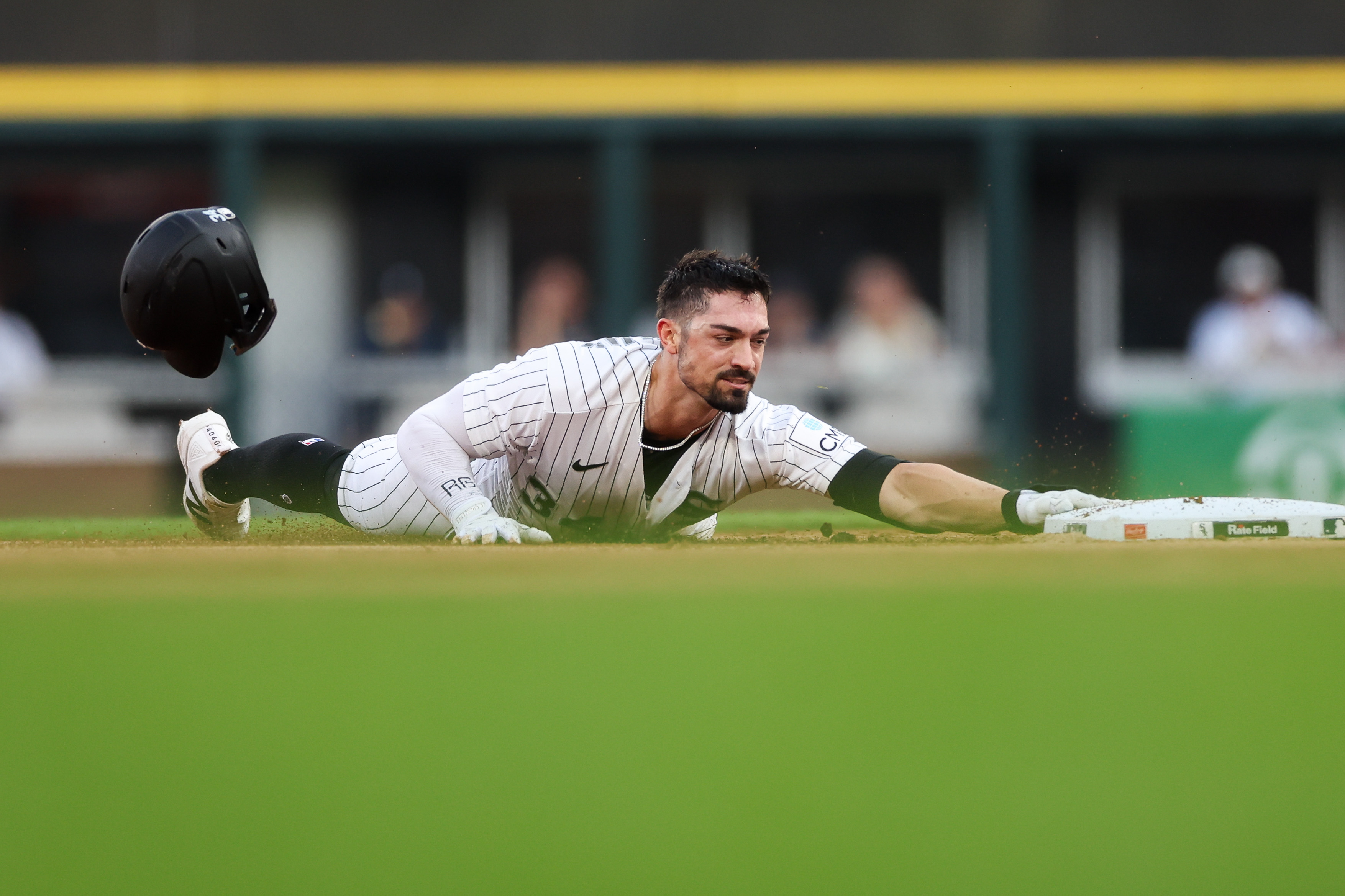White Sox designated hitter Randal Grichuk (34) slides into second past Yankees second baseman Jazz Chisholm Jr. (13) after hitting a double during the first inning at Rate Field July 27, 2026 in Chicago. (Armando L. Sanchez/Chicago Tribune)