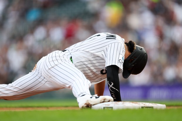 White Sox first baseman Munetaka Murakami (5) slides into third during the first inning against the Yankees at Rate Field July 27, 2026 in Chicago. (Armando L. Sanchez/Chicago Tribune)
