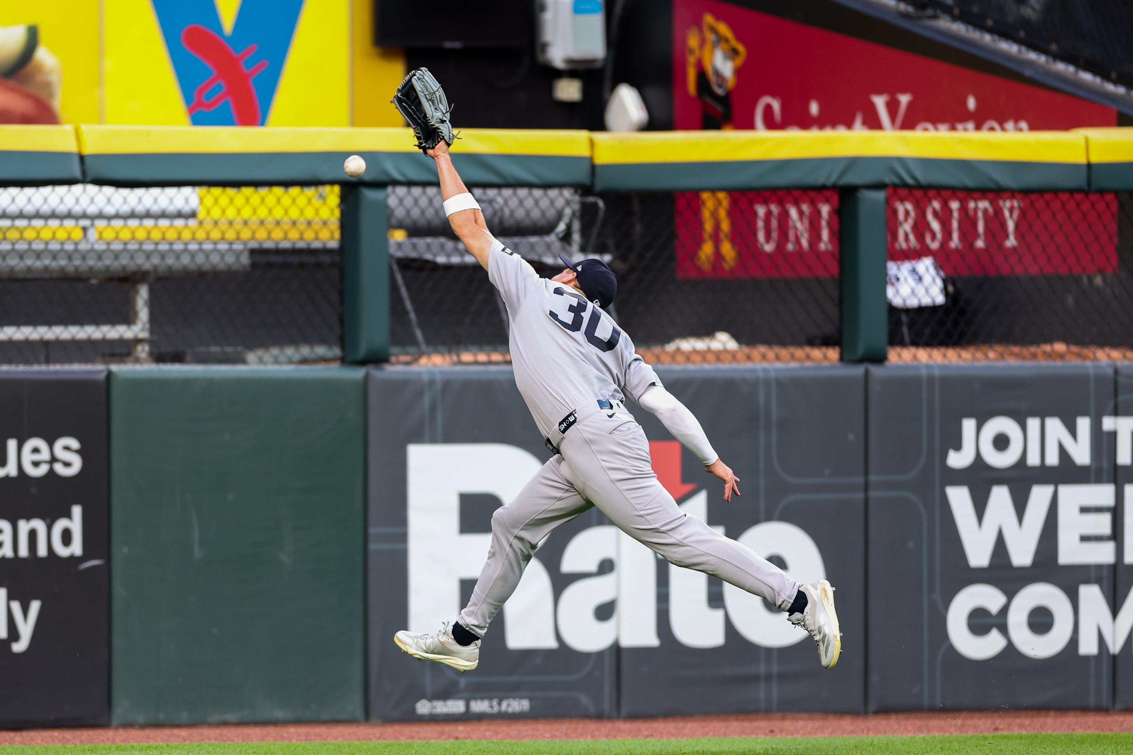 Yankees shortstop Max Schuemann (30) misses a RBI triple from White Sox right fielder Braden Montgomery (24) during the first inning at Rate Field July 27, 2026 in Chicago. (Armando L. Sanchez/Chicago Tribune)