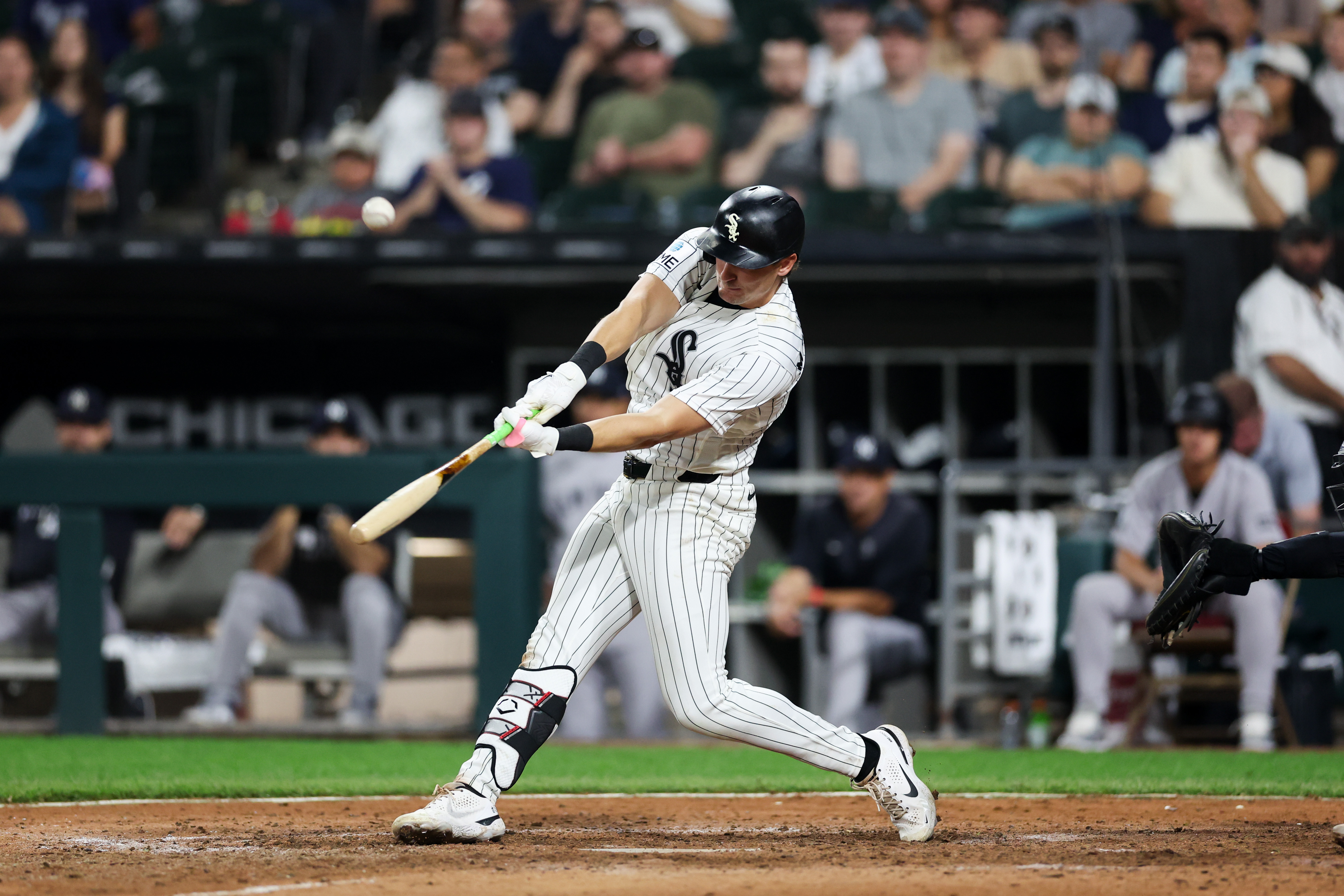 White Sox shortstop Colson Montgomery (12) hits a RBI single during the ninth inning at Rate Field July 27, 2026 in Chicago. (Armando L. Sanchez/Chicago Tribune)