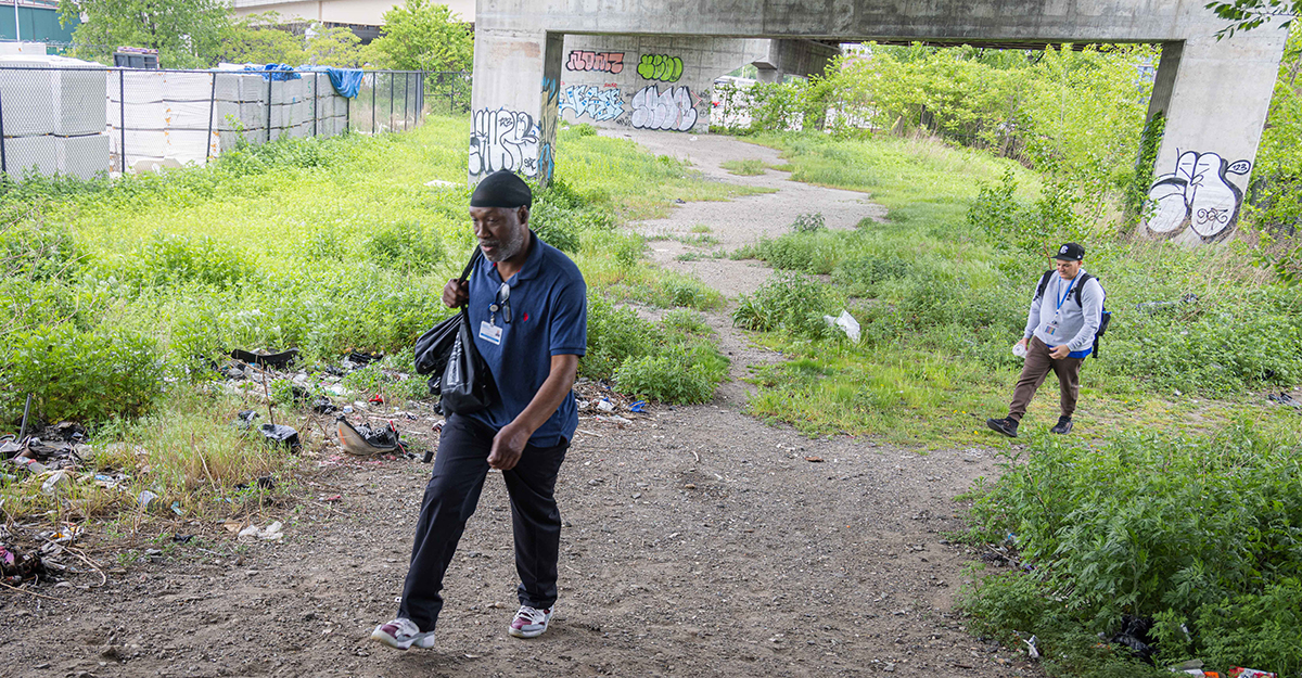 While many care providers work in traditional spaces like hospitals, clinics, nursing homes and residential settings, Jose and Andre tread paths that many of us would never dare take. Here, they make their way to a homeless encampment adjacent to the 138th Street bridge for a wellness check. (4/4)