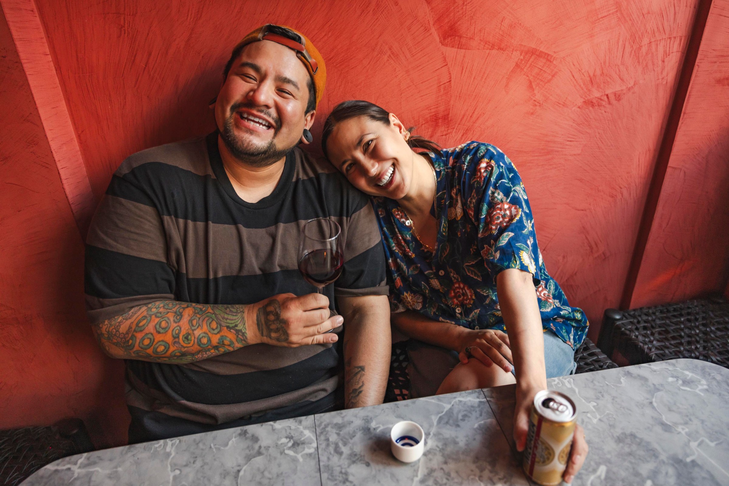 Two people sitting at a table.