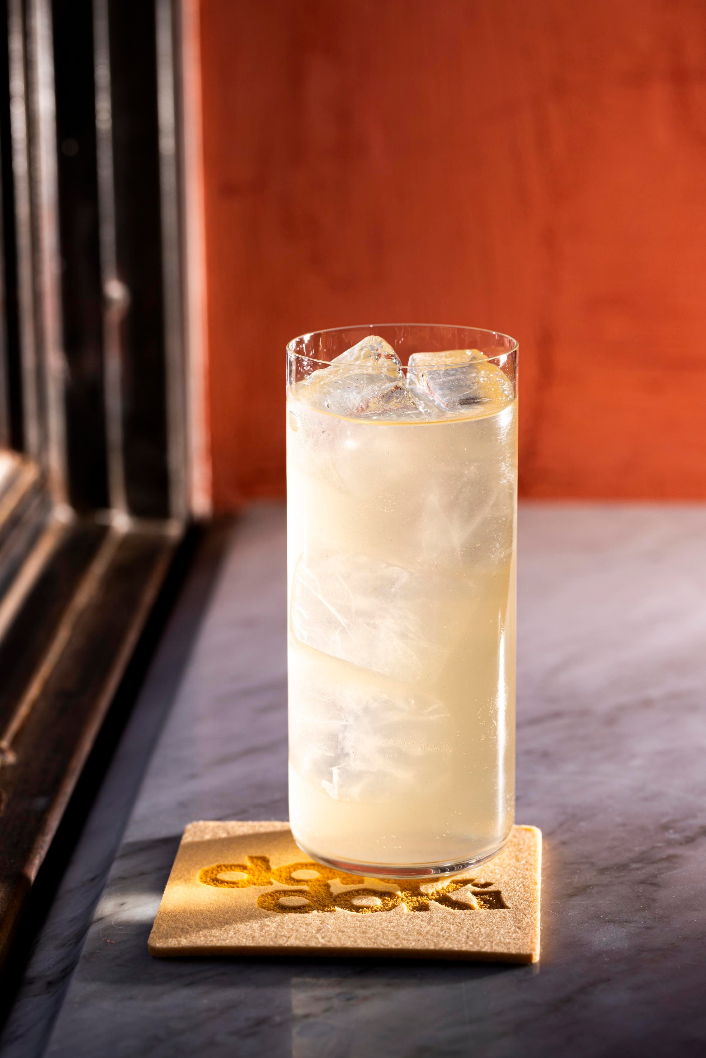 A tall cocktail with ice.