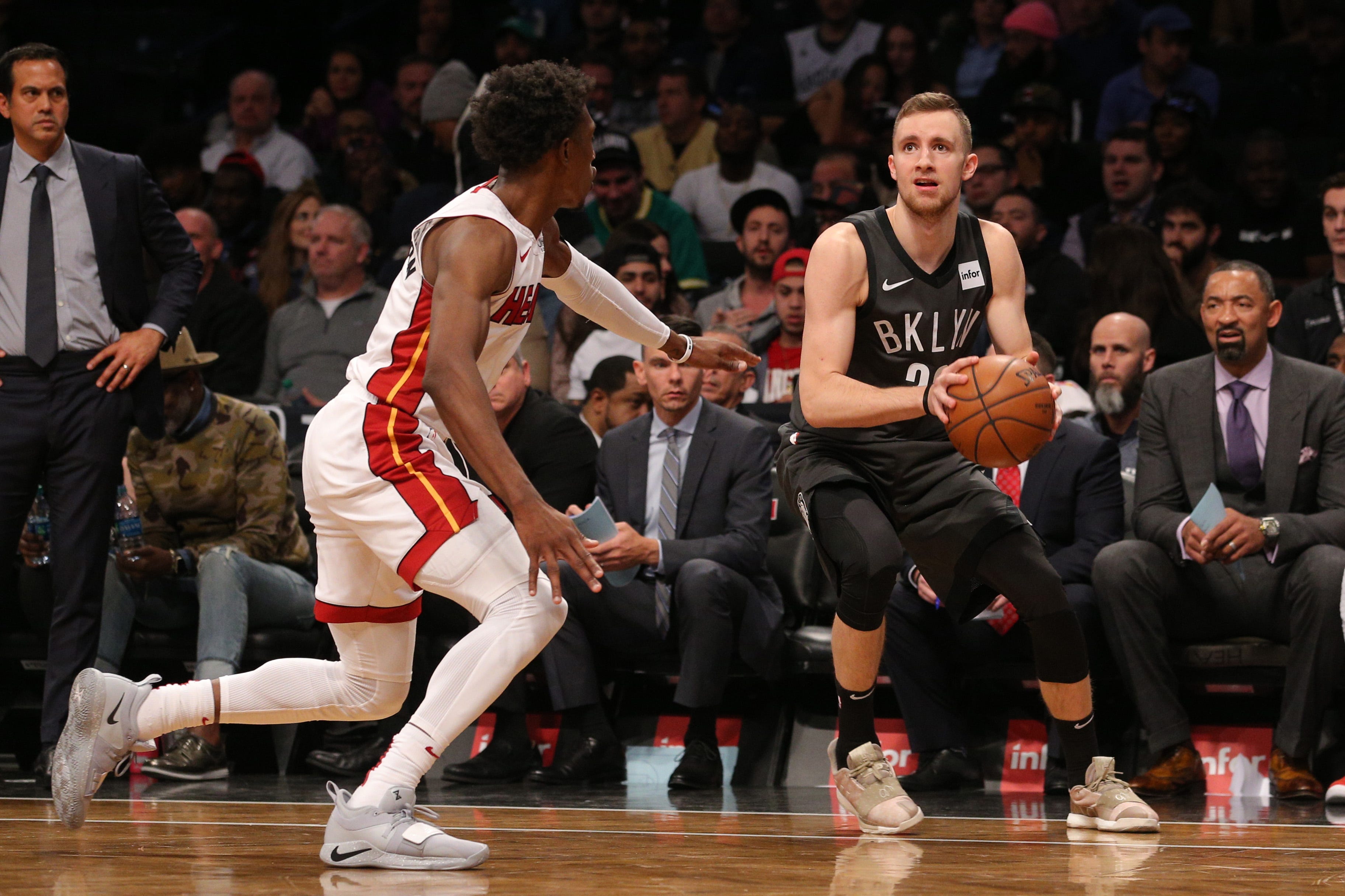 Nov 14, 2018; Brooklyn, NY, USA; Brooklyn Nets shooting guard Dzanan Musa (30) shoots against Miami Heat shooting guard Josh Richardson (0) during the fourth quarter at Barclays Center. Mandatory Credit: Brad Penner-USA TODAY Sports