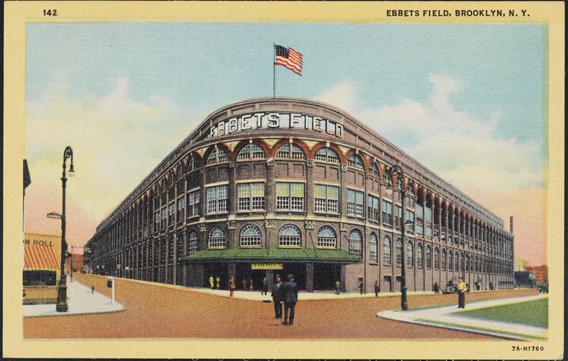 Historic postcard of Ebbets Field in Brooklyn, NY, showcasing the stadium's facade with an American flag and surrounding street scene.