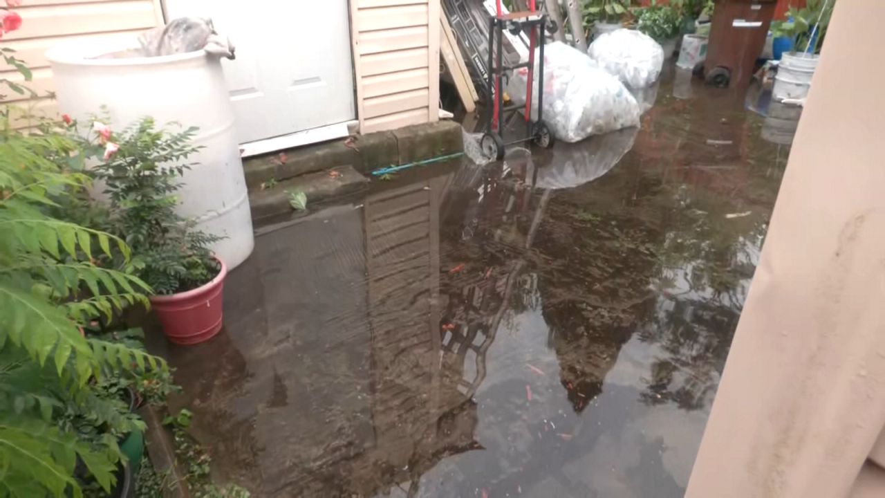 Flushing residents deal with flash flooding aftermath