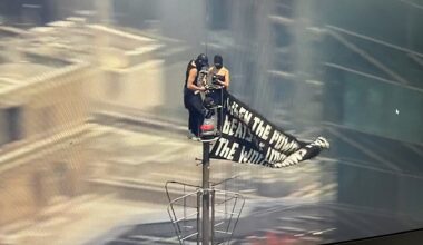 Two people scale Empire State Building in New York City