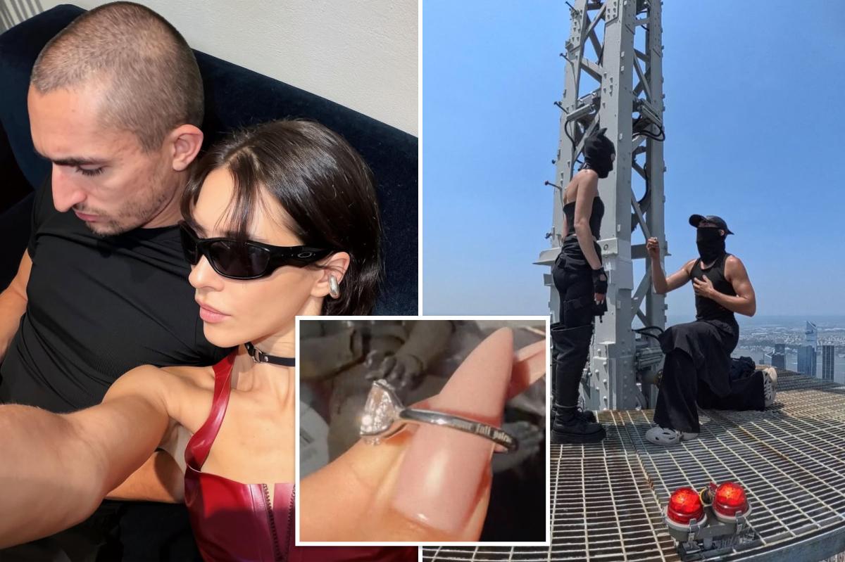 Daredevil darlings arrested after scaling Empire State Building in wild engagement stunt finally get ring back
