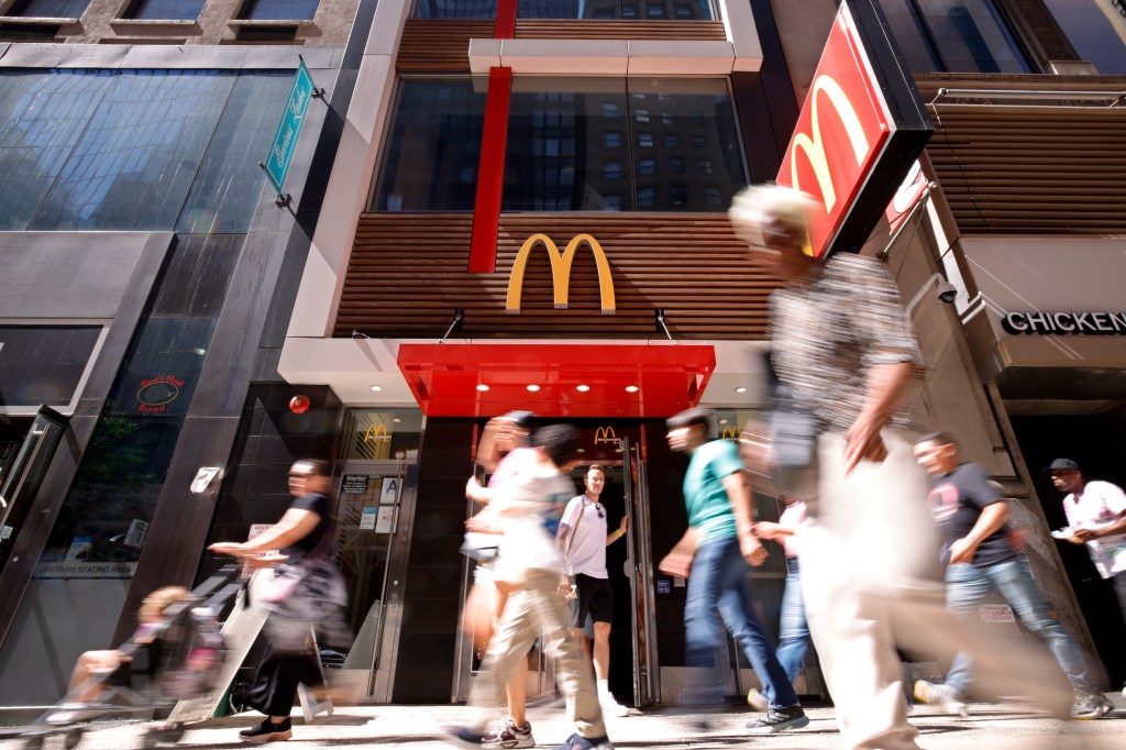 People walking past the McDonald's in Midtown East. 