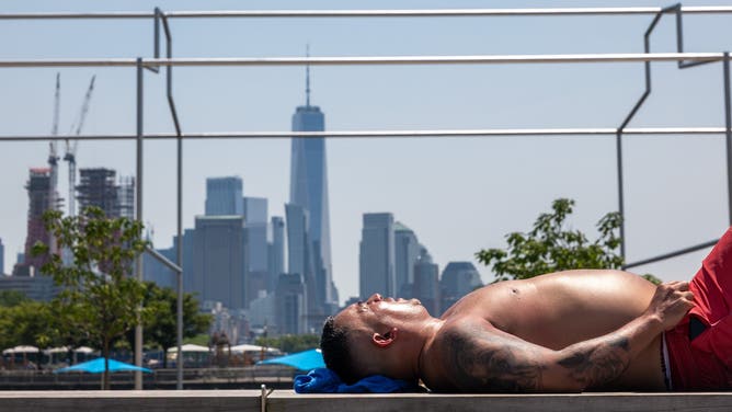 NEW YORK, NEW YORK - JUNE 04: People enjoy an unusually warm day in New York City as temperatures reach the low 80s on June 04, 2025 in New York City. New York City and some surrounding areas are under an air quality alert on Wednesday due to hundreds of wildfires burning across Canada, which are sending smoke into parts of the U.S. Temperatures are expected to surpass 90 degrees on Thursday.