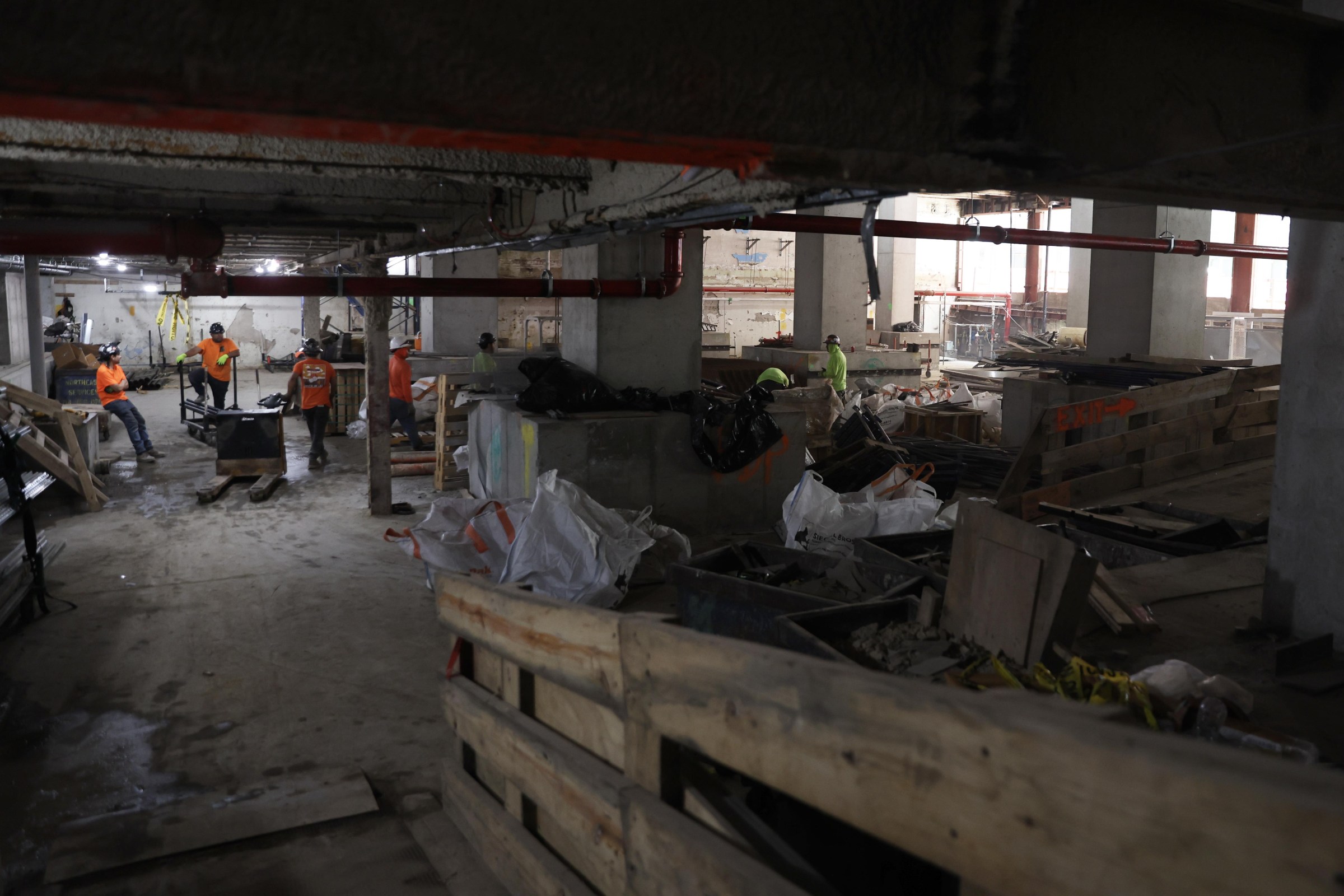 Workers in the former Pfizer Inc. headquarters during an office conversion to rental apartments in New York, US, on Wednesday, Aug. 13, 2025. Photographer: Heather Khalifa/Bloomberg via Getty Images