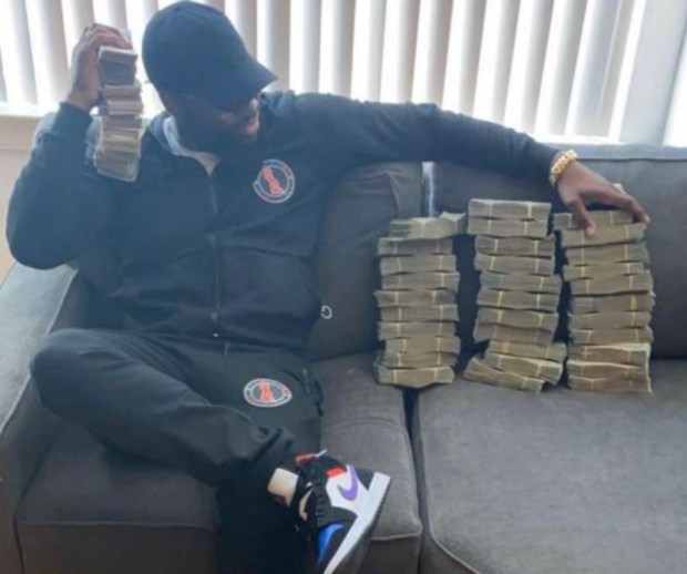 Franklin Gillespie at a Bully Gang stash house. (DOJ)