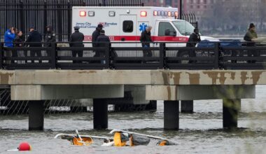 Emergency personnel respond to a helicopter crash on the Hudson River, April 10, 2025, in Jersey City, N.J.