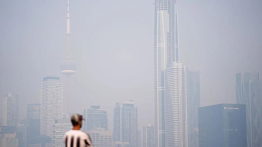 Hundreds of Canada wildfires prompt US air quality alerts as smoke spreads south