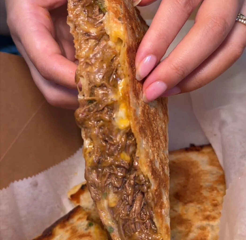 This Crunchy NYC Quesadilla Is Packed With Steaming Birria And You Need It Immediately
