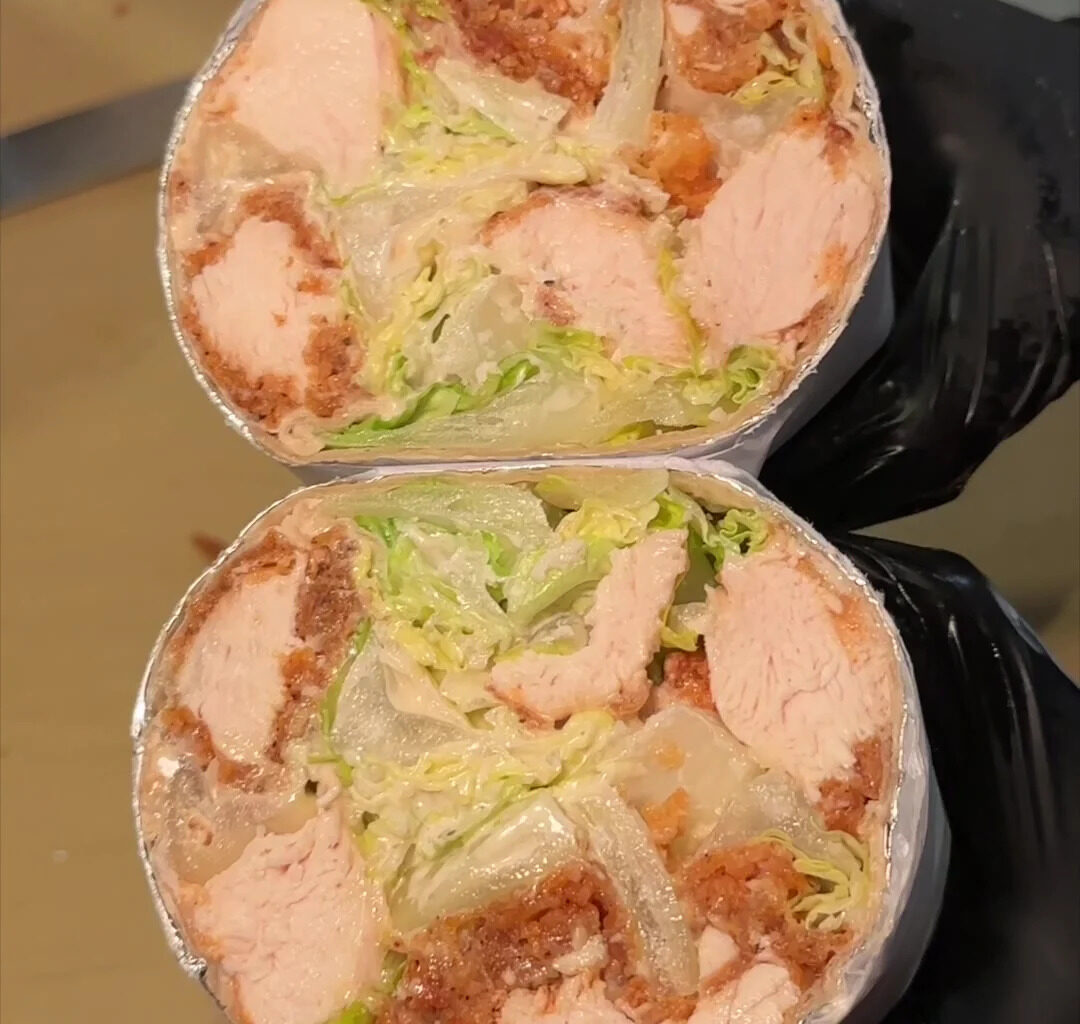 This Brooklyn Food Hall Secret Is Serving The Most Loaded Chicken Caesar Wrap In New York
