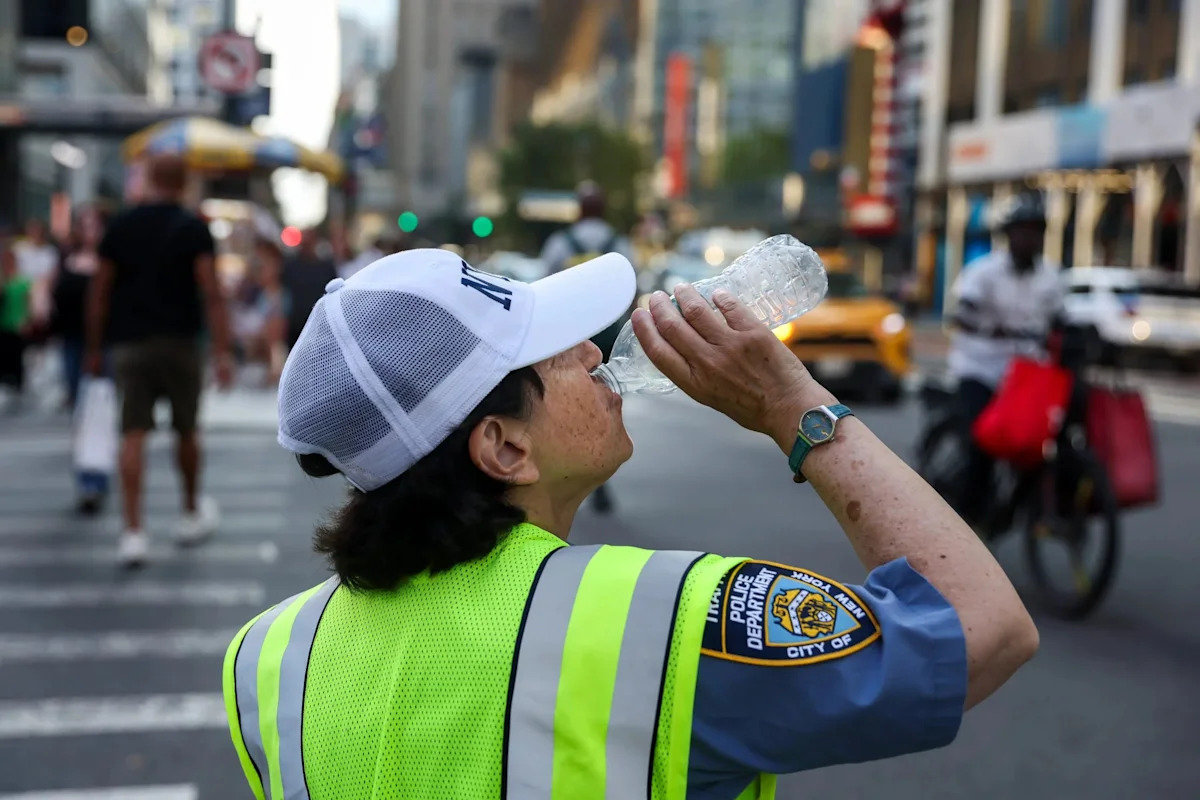 How low will temperatures drop during the heat wave in New York City?