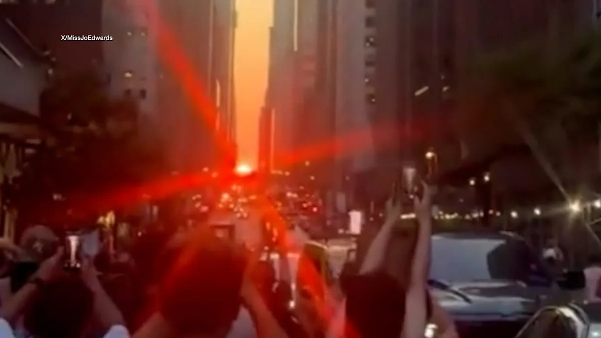 Crowds gather to watch 'Manhattanhenge' in New York