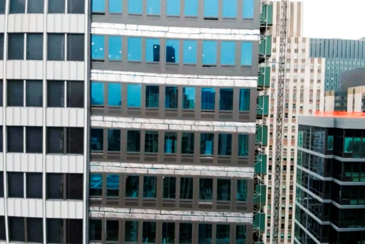 NYC high-rise in danger of collapse faced complaints including workers blowing material off roof with a leaf blower