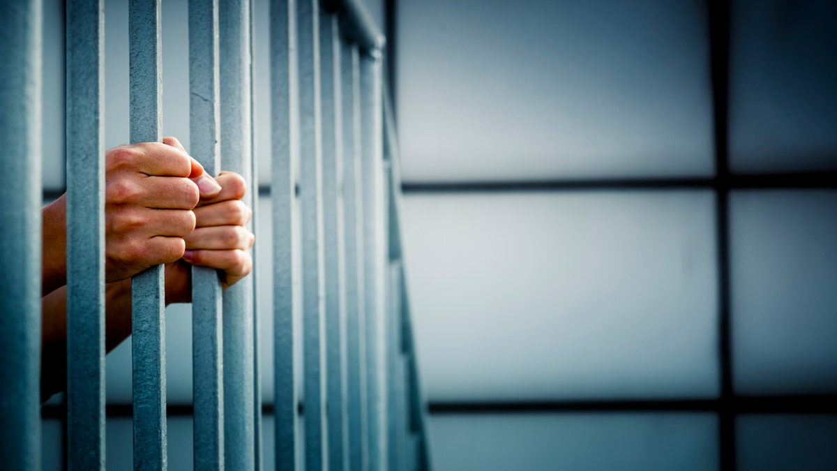 Prisoner in the jail cell