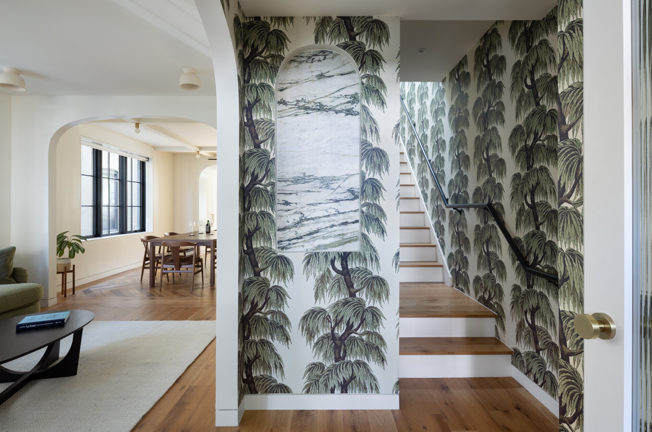 ENTRY HALL WITH WALLPAPER STAIRS GOING UP LIVING ROOM DINING ON LEFT