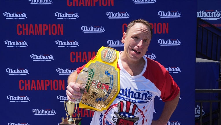 NEW YORK, NEW YORK - JULY 4: Joey Chestnut wins the men's competition at Nathan's Annual Hot Dog Eating Contest on July 4, 2025 in New York City. Joey Chestnut makes his return to the Nathan's Famous 4th of July Hot Dog Eating Contest to compete for a 17th win after missing the 2024 event due to a sponsorship dispute with Major League Eating. (Photo by Adam Gray/Getty Images)