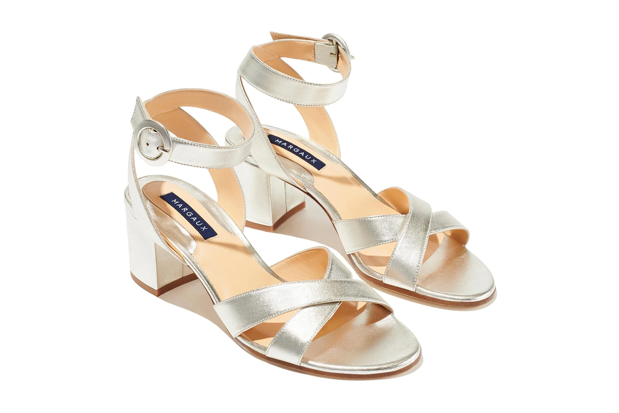 Pair of metallic silver Margaux City Sandals with block heels and ankle straps.