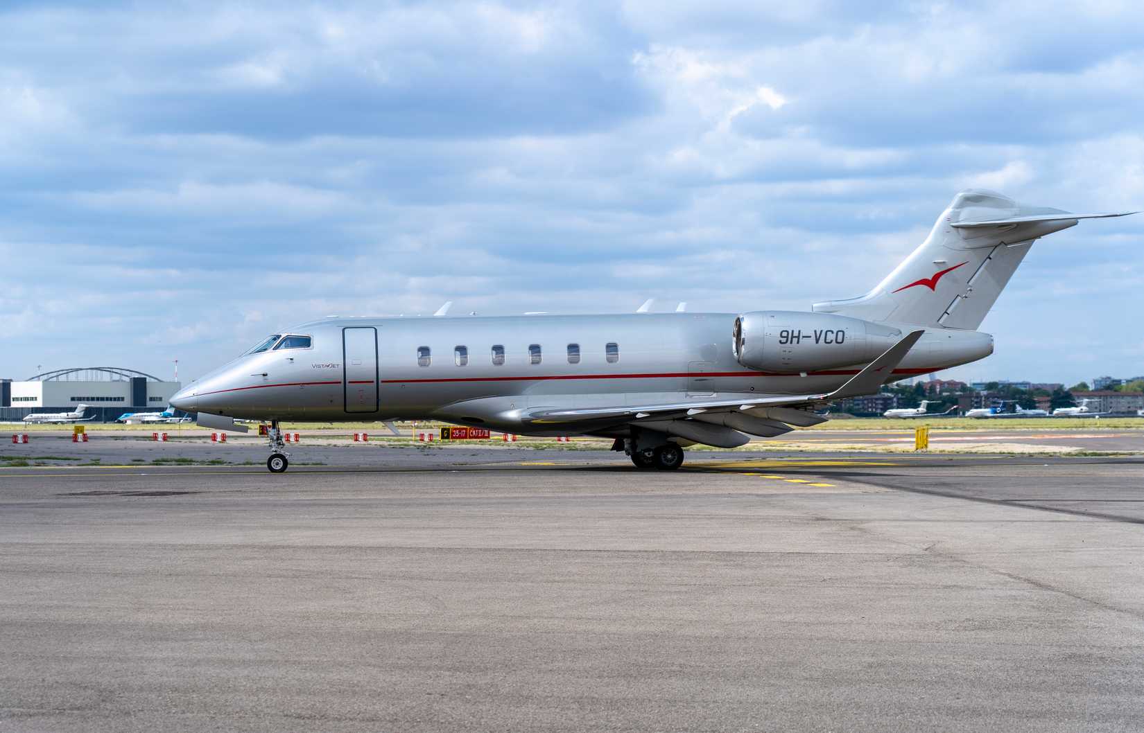 NetJets private flight. Bombardier Challenger 350 at LIN Milano Linate international airport