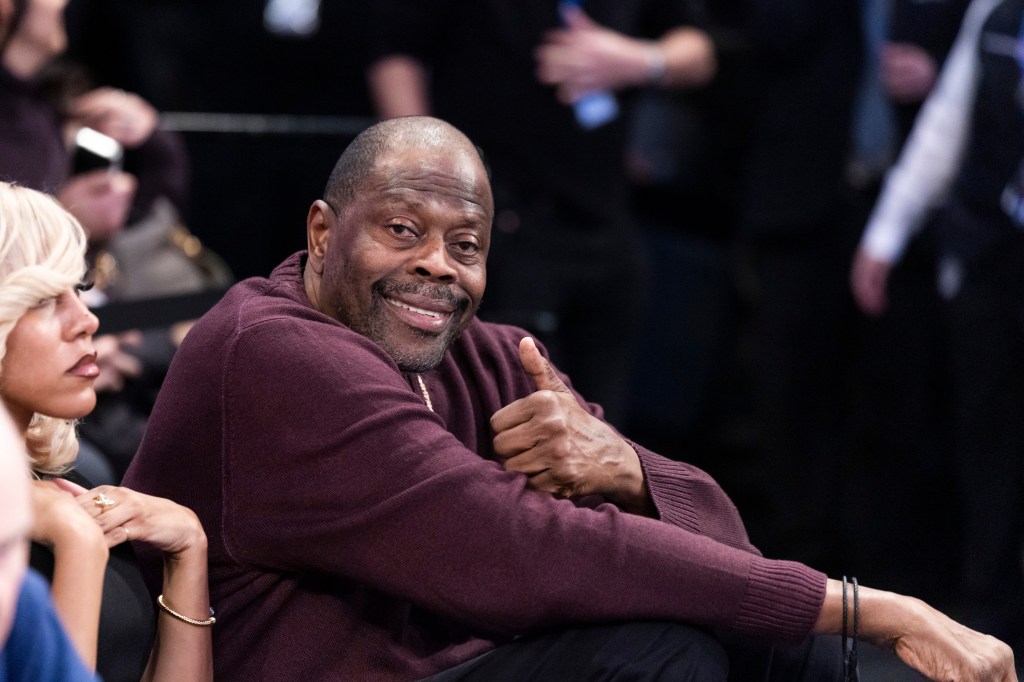 Patrick Ewing giving a thumbs up.