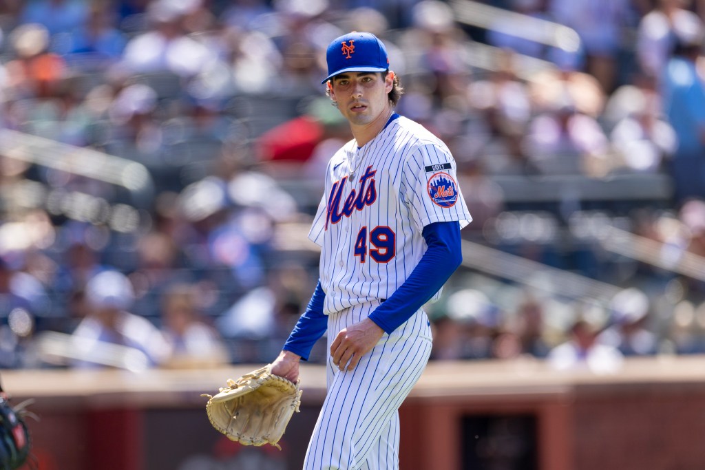 Zach Thornton walking to the dugout after the seventh inning.