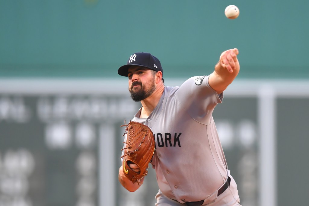 New York Yankees pitcher Carlos Rodón delivers a pitch.