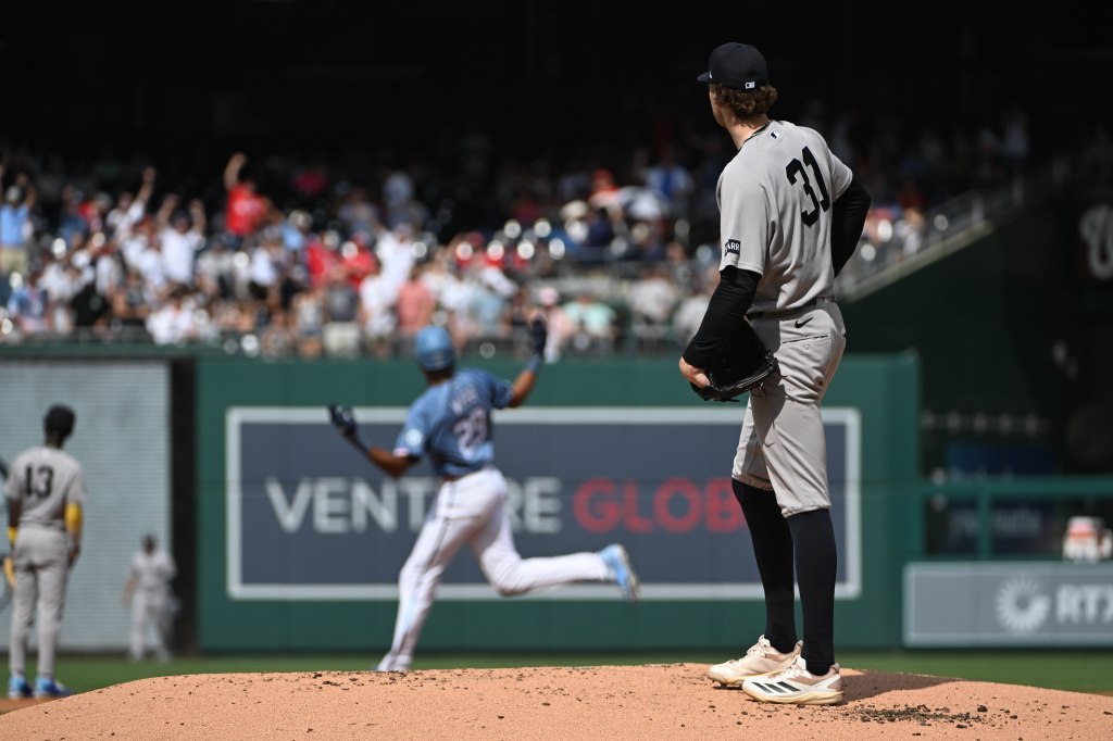 New York Yankees pitcher Cam Schlittler reacts after giving up a solo home run to Washington Nationals right fielder James Wood.