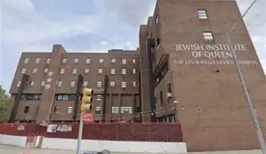 Hammer-wielding man held without bail after chasing after woman into Jewish school in Elmhurst, where he assaulted a youngster and bit an employee: DA
