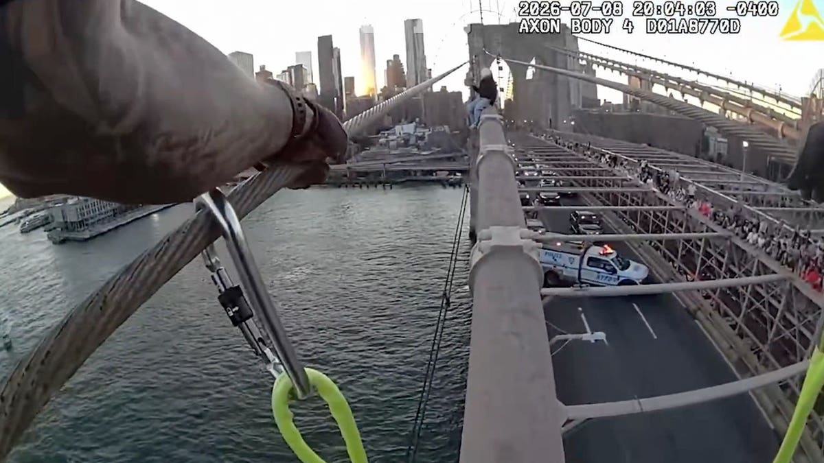 Body camera video captures an NYPD officer speaking with a woman in crisis atop the Brooklyn Bridge