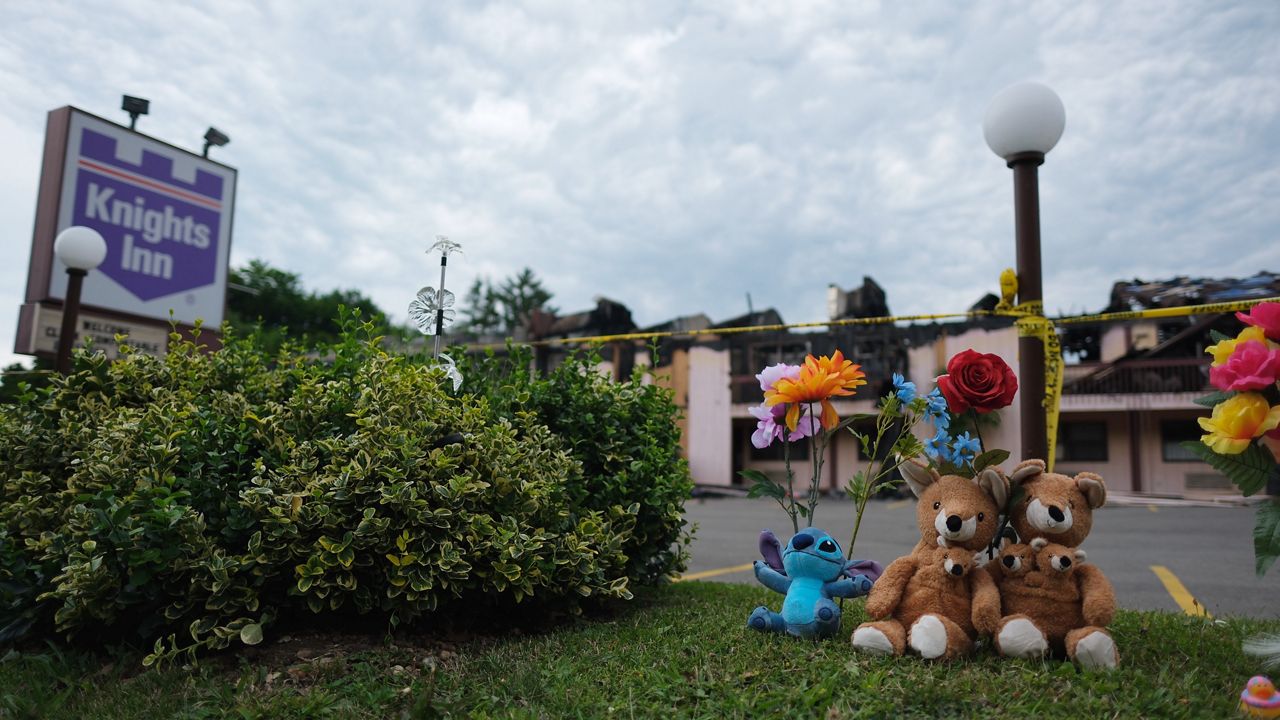 A memorial in front of the Knights Inn.