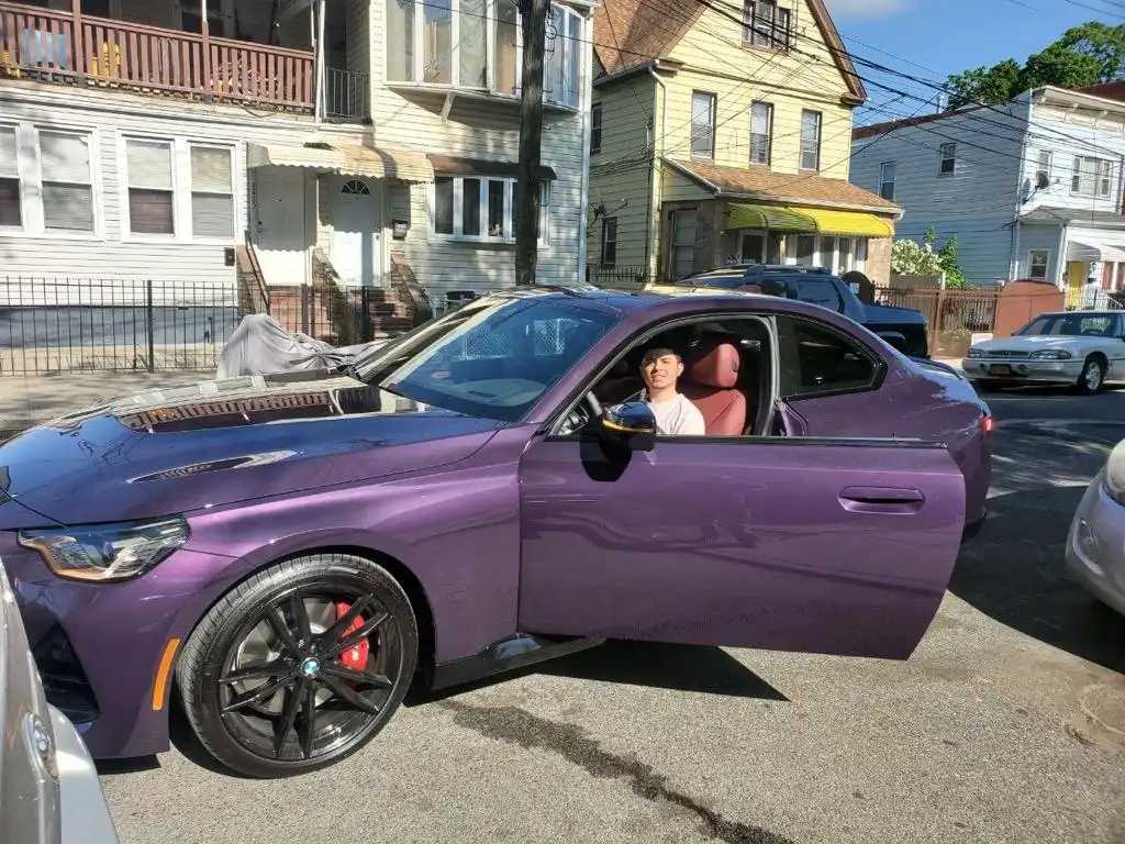 Justin Diaz in the purple BMW he was ultimately killed in. 